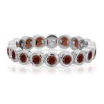 The Rose Bouquet Ring in white gold on a white background.