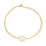 A Baroque White Pearl Bangle on a white background. 