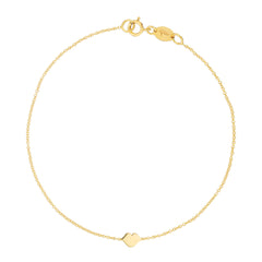 A yellow gold Lip Bracelet on a white background. 