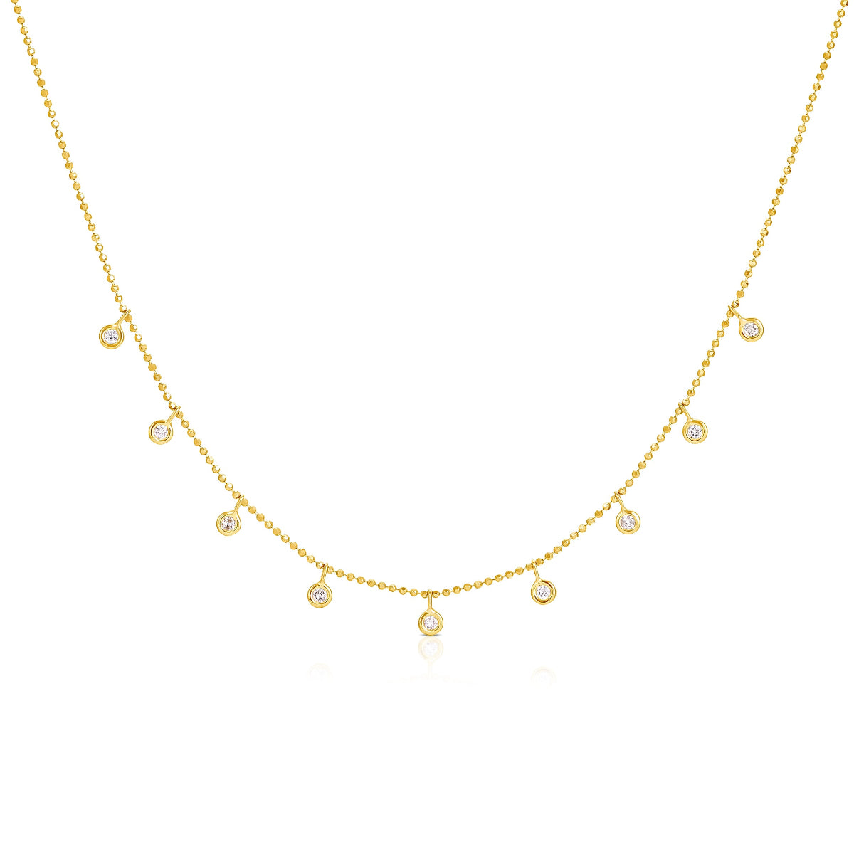 A yellow gold Stardust Diamond Necklace on a white background. 