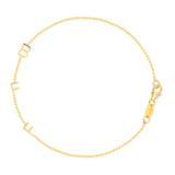 A yellow gold BFF Bracelet in a beaded chain bracelet on a white background. 
