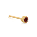 A Birthstone Stud - Garnet (January) in yellow gold on a white background. 