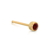 A Birthstone Stud - Garnet (January) in yellow gold on a white background. 