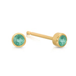 A pair of Birthstone Studs - Emerald (May) in yellow gold on a white background.