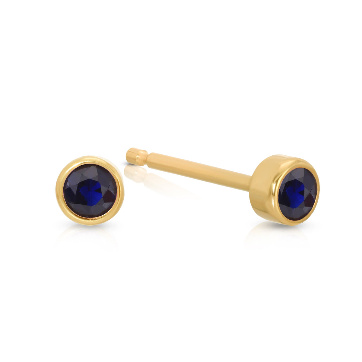 A pair of Birthstone Studs - Sapphire (September) in yellow gold on a white background.