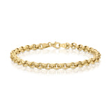 A Rolo Bracelet in yellow gold against on a white background. 