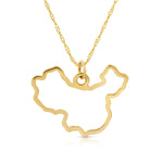 A China pendant necklace in yellow gold on a white background.  