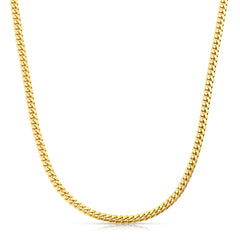 A Chic Cuban Curb Chain in yellow gold on a white background. 