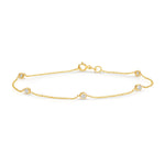 A Starstuck Diamond Bracelet in yellow gold on a white background. 