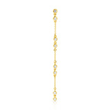 A Stardust Earring in yellow gold on a white background. 