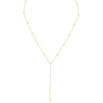 A Starstruck Diamond Lariat in yellow gold on a white background. 