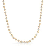 The Ultimate Diamond Necklace in yellow gold on a white background. 