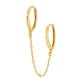 Double Huggie Earring with Chain on a white background. 