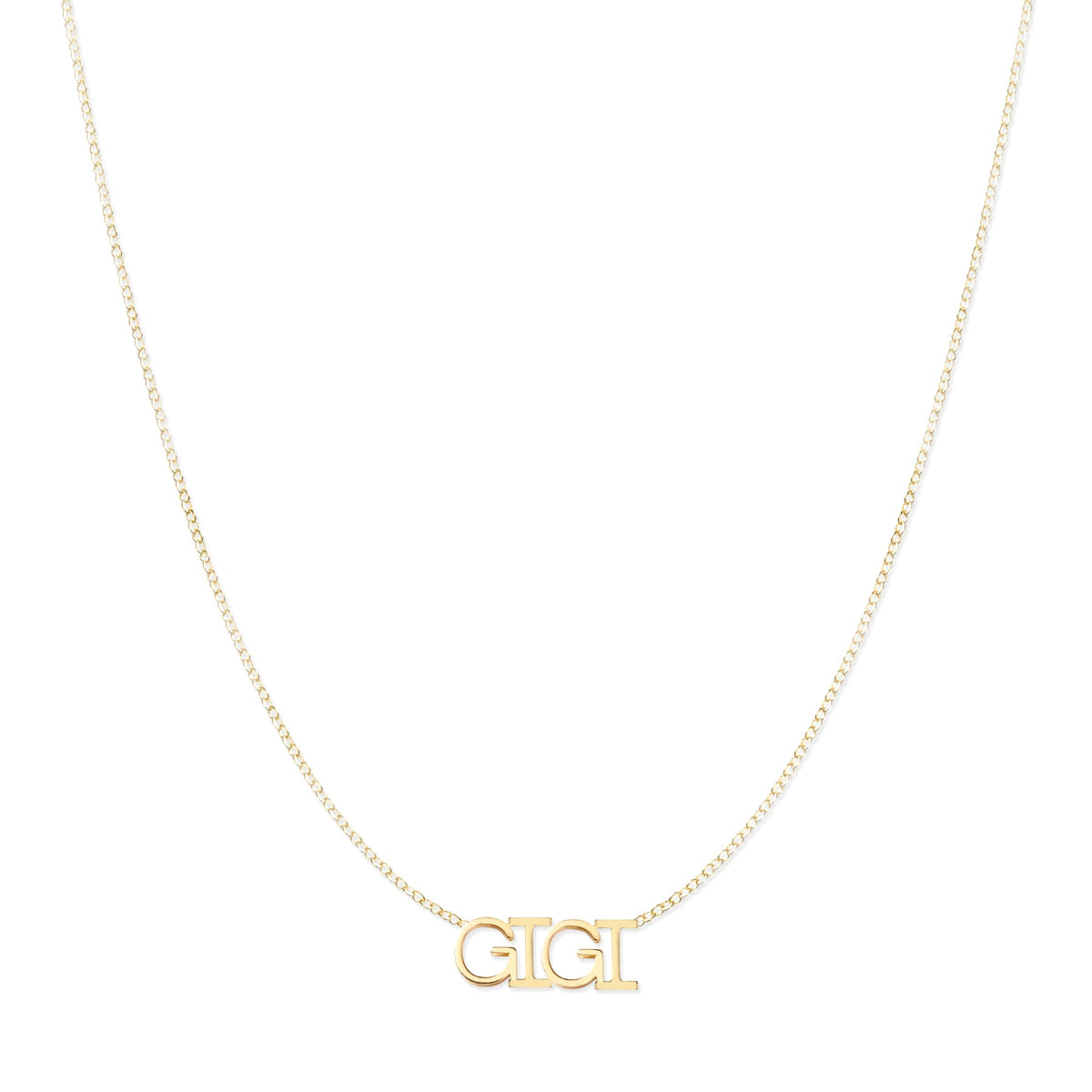 A GIGI Necklace in yellow gold on a cable chain on a white background. 