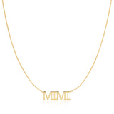 A MIMI Necklace in yellow gold on a cable chain on a white background.