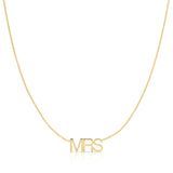 A MRS Necklace in yellow gold on a cable chain on a white background. 