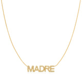 A Pavé 'Madre' Necklace in yellow gold on a cable chain on a white background.