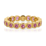 The Peony Bouquet Ring in yellow gold on a white background. 