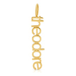 A yellow gold Petite Nameplate Pendant with 'theodore' on a white background. 