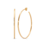 A Sleek & Chic Hoops - Medium in yellow gold on a white background. 