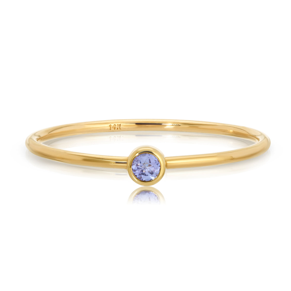 A Birthstone Ring in Tanzanite - December  on a white background. 