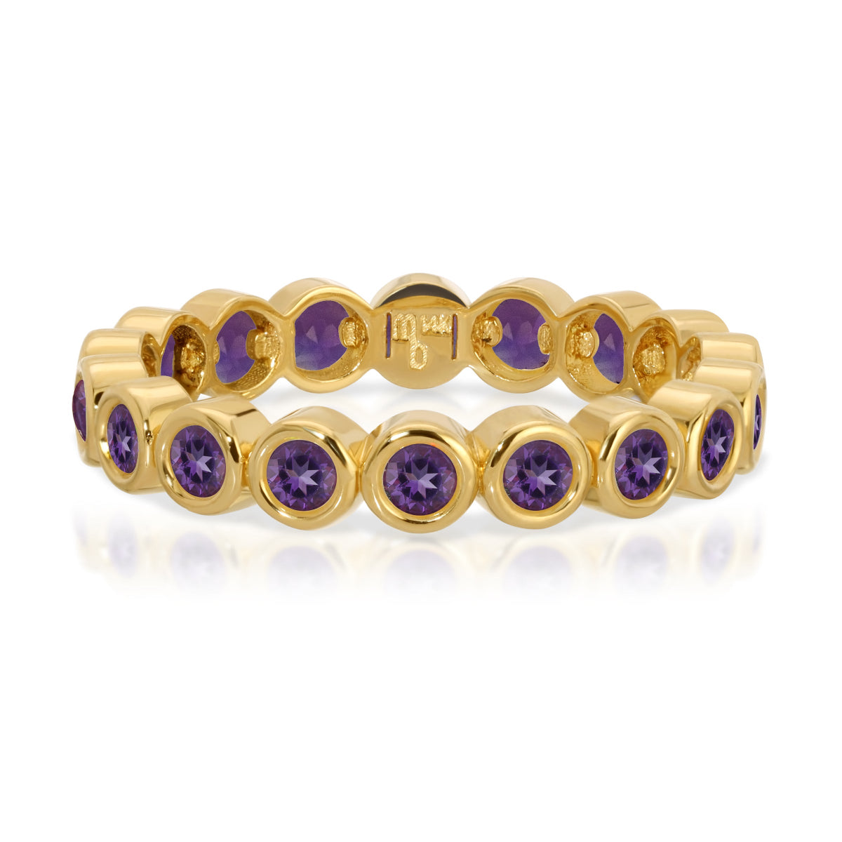The Violet Bouquet Ring in yellow gold on a white background. 