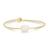 A Baroque White Pearl Bangle on a white background. 