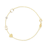 Gold bracelet with letter 'S', heart, and round charm on a white background