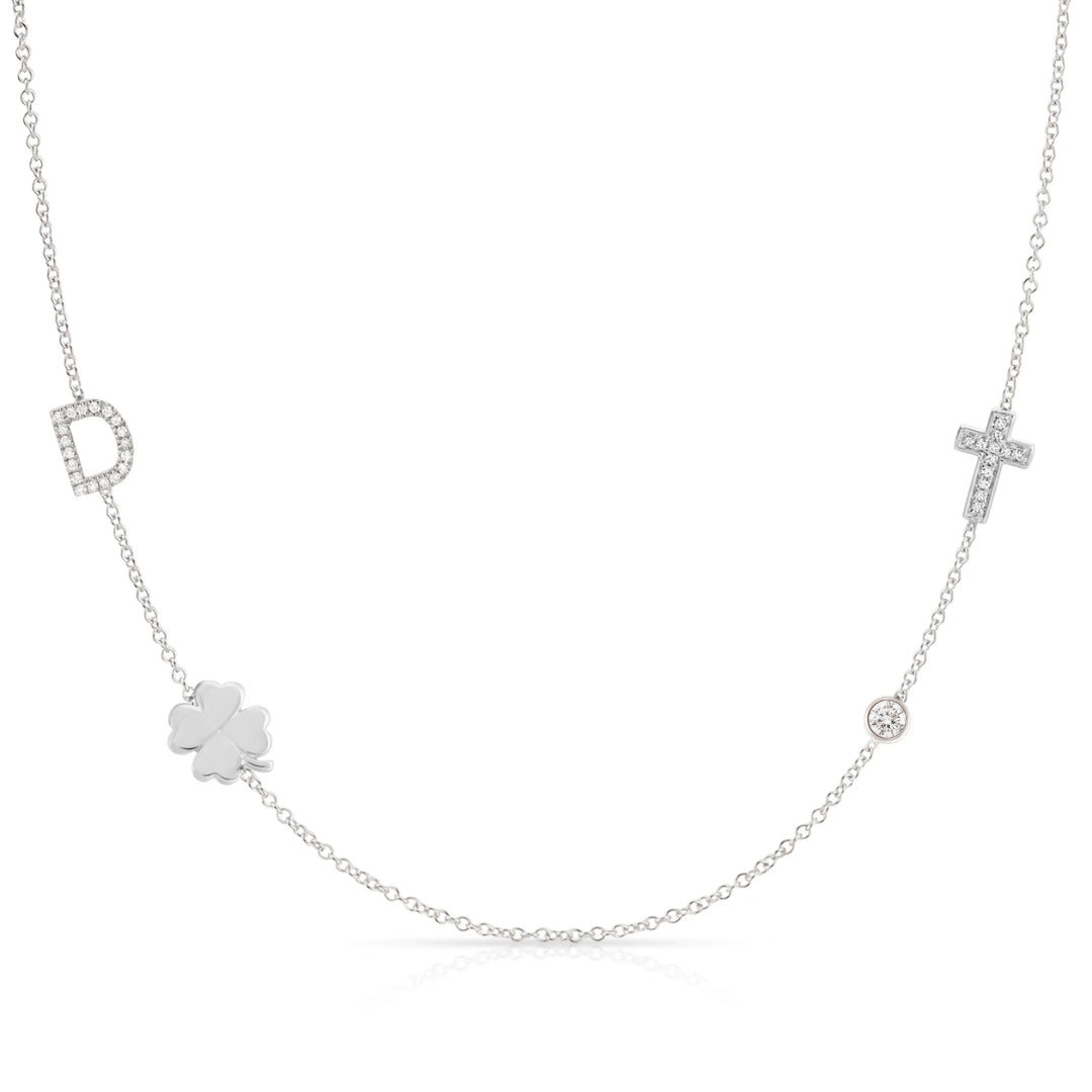 white gold Necklace with various pendants including a clover, cross, and diamond on a white background