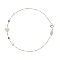 white gold bracelet with heart and birthstone and diamond charms on a white background