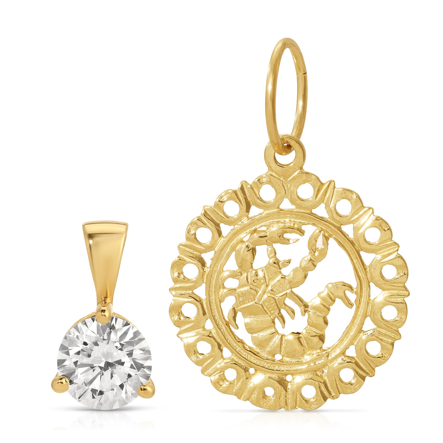 Gold pendant with intricate design and clear gemstone on a white background