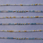 Six Endless Summer Bracelets in Saint-Tropez and Blue Lagoon laid horizontally against a light purple background. 