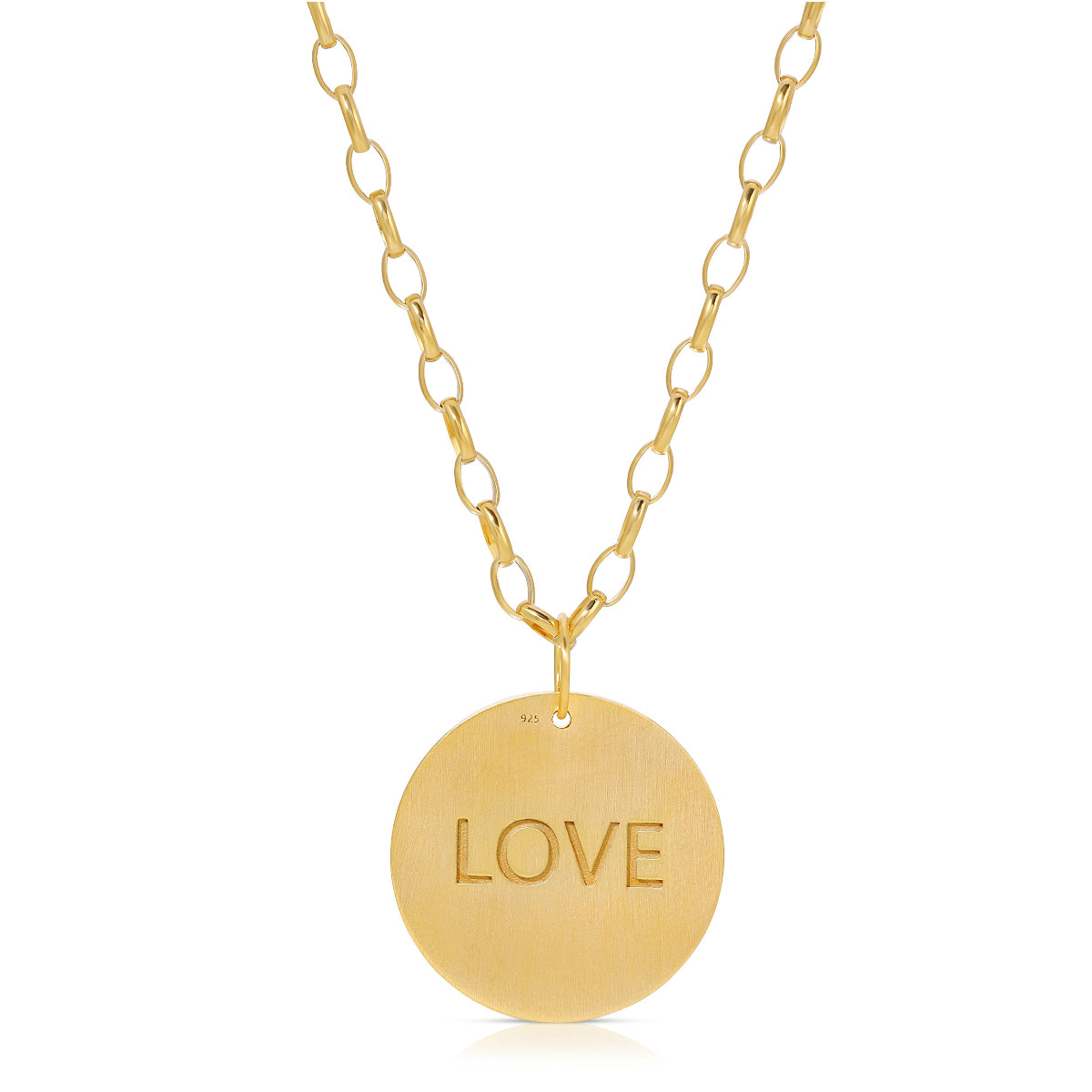 The back of a Virtues Pendant - Circle in yellow gold with 'LOVE' engraved on a white background. 