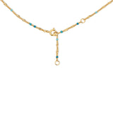 The back of a Confetti Necklace - blue on a white background. 