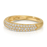 A Cosmo Ring in yellow gold on a white background. 
