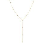 A Starstruck Diamond Lariat in yellow gold on a white background. 