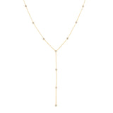 A Starstruck Diamond Lariat in yellow gold on a white background. 