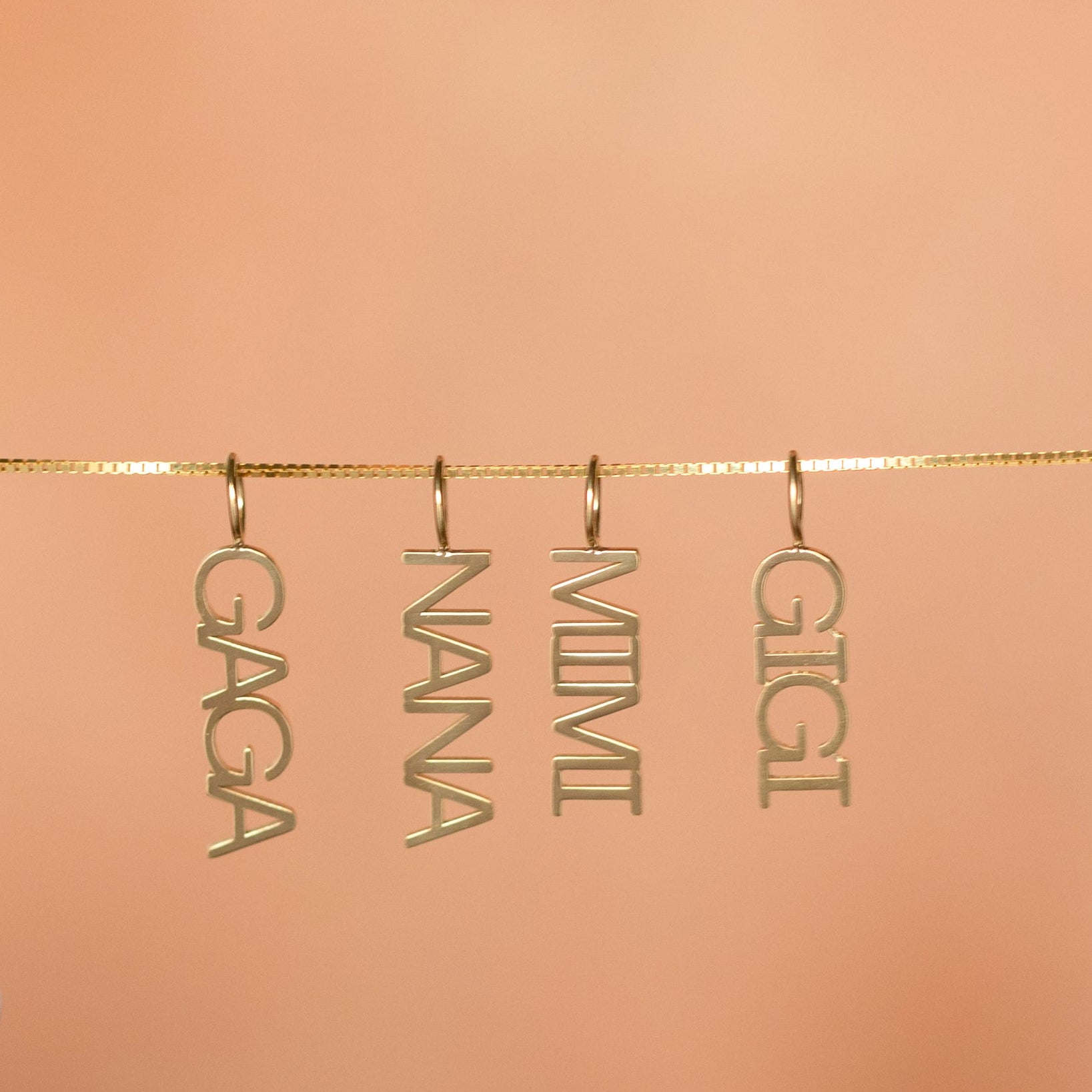 14k gold word plate charms GAGA, NANA, MIMI and GIGI on gold chain for grandma necklaces.