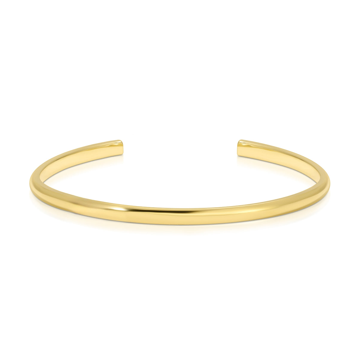 A gold vermeil Rendezvous Cuff on a white background. 
