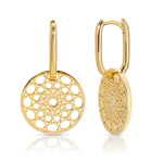 Skylight Hoops in yellow gold on a white background. 