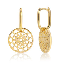 Skylight Hoops in yellow gold on a white background. 