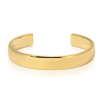 A gold vermeil All in Cuff on a white background. 