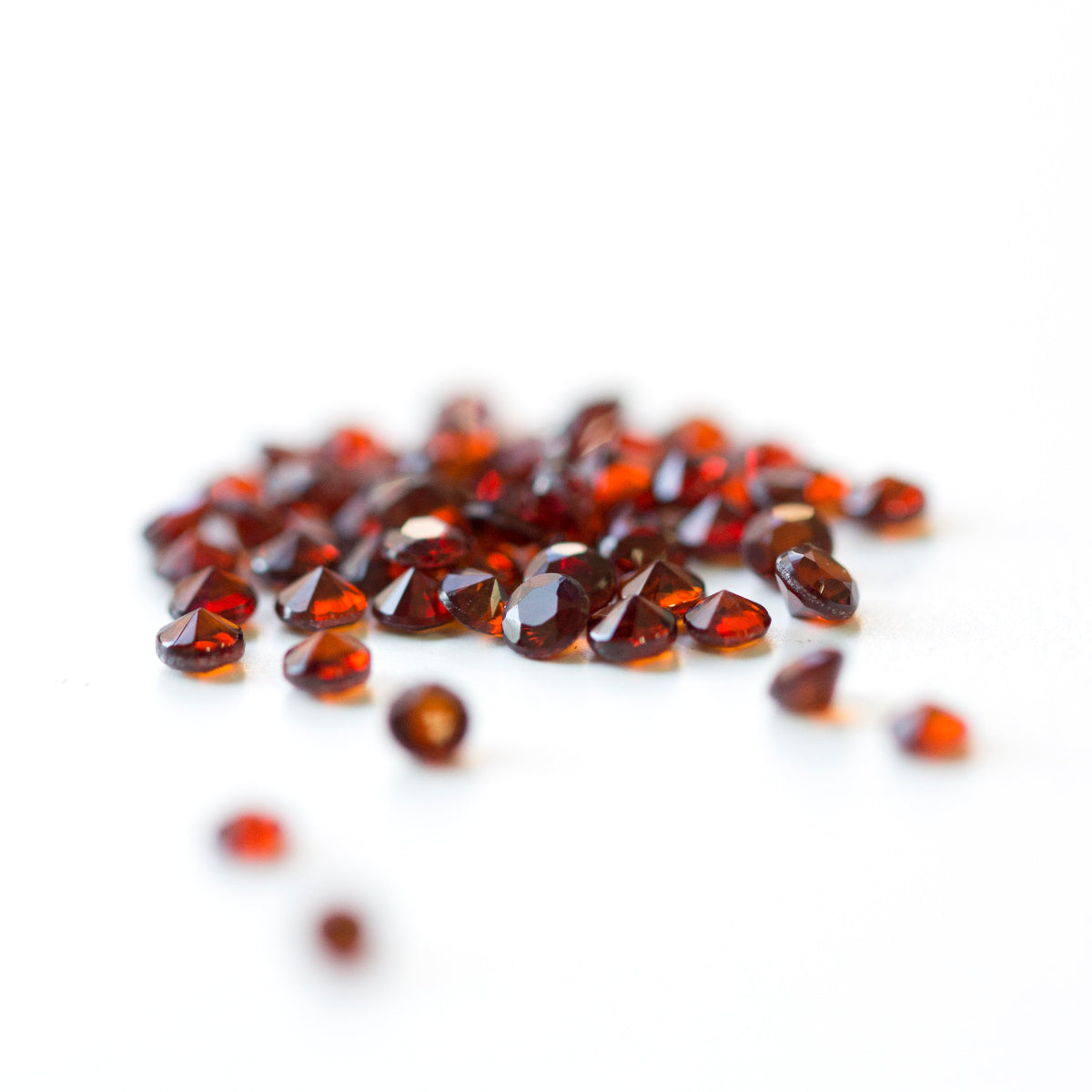 January garnet birthstones on a white background. 