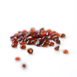 January garnet birthstones on a white background. 