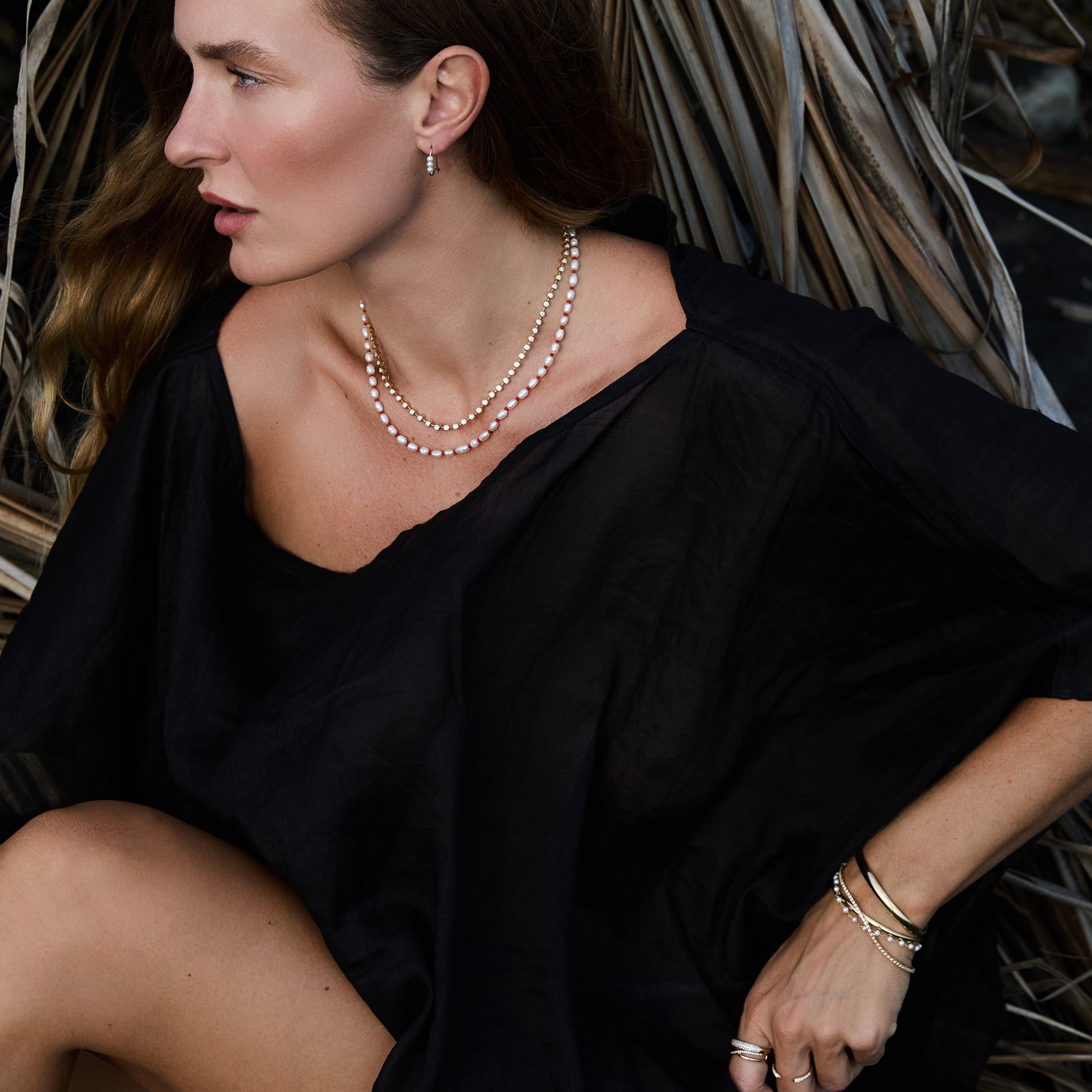 Model wearing the Ultimate Diamond Necklace layered with the Cabana Pearl Necklace.