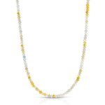 An Endless Summer Necklace - Saint-Tropez on a white background. 