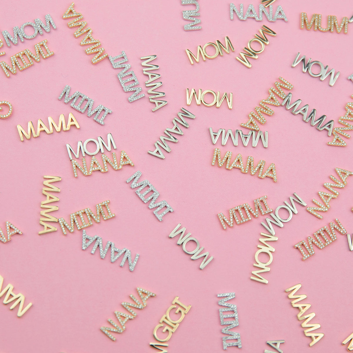 Yellow gold and white gold word plate pendants, some pavé, featuring MOM, MIMI, MAMA, NANA and GIGI, displayed on a pink background.