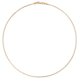 Gold omega chain necklace on a white background