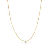 A Single Birthstone Layering Necklace - Yellow Gold in Diamond - April on a white background.