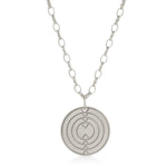 Virtues Pendant - Circle in sterling silver on a white background. 